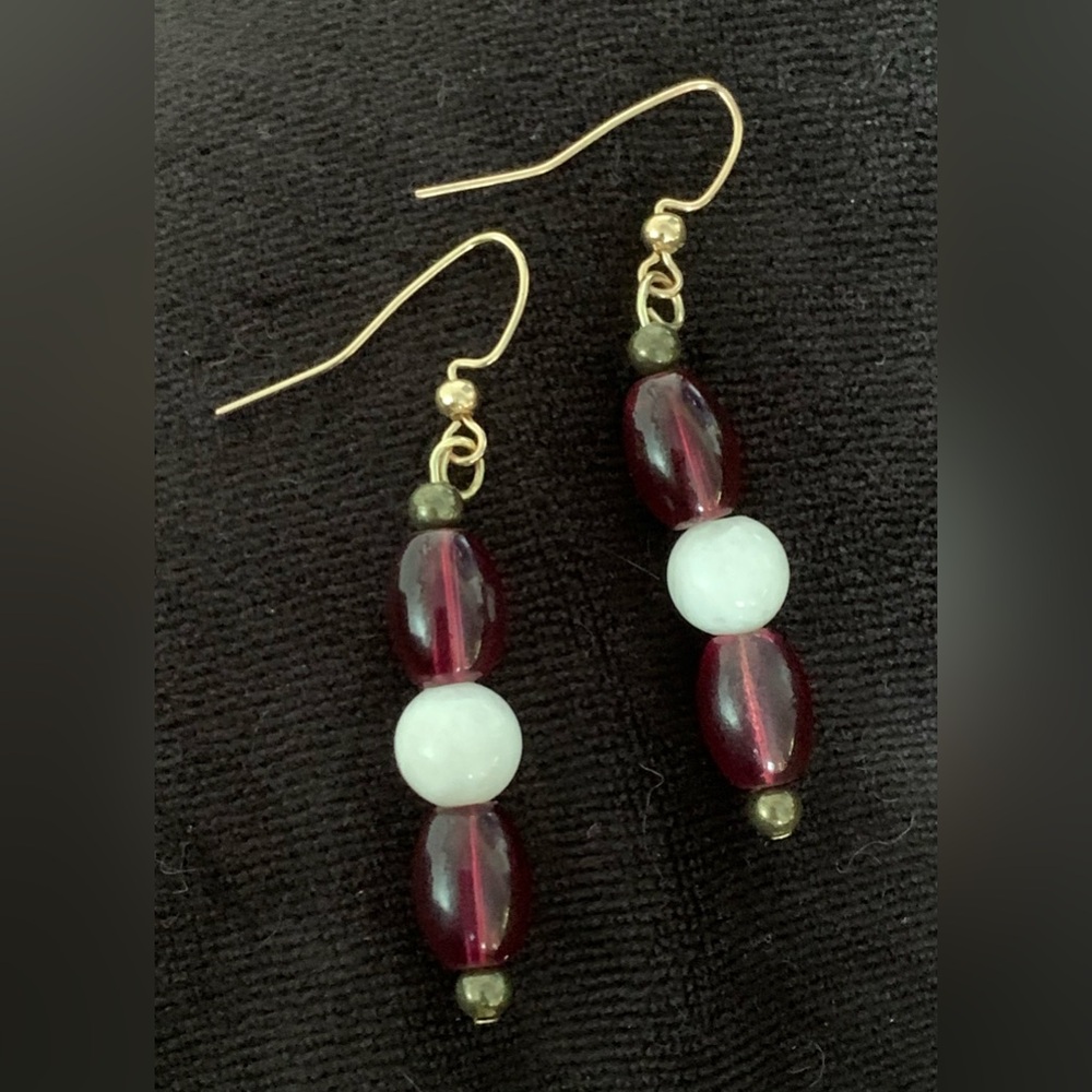 Hand Crafted earrings w/ raspberry vintage glass beads and moonstone. Hang 2.25”